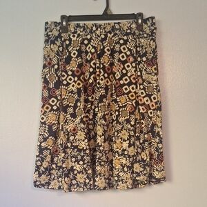 LuLaRoe Black and Cream Geometric Floral Skirt